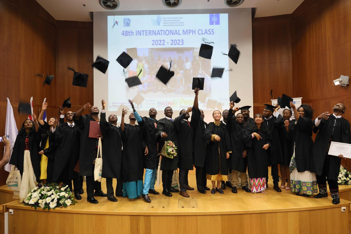 IMPH Class of 2023 throw up their graduation caps in celebration of their major accomplishments as the graduation ceremony is completed